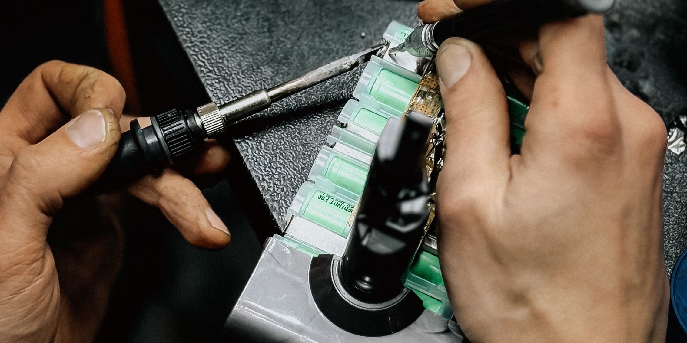 Hand soldering an electronic circuit board