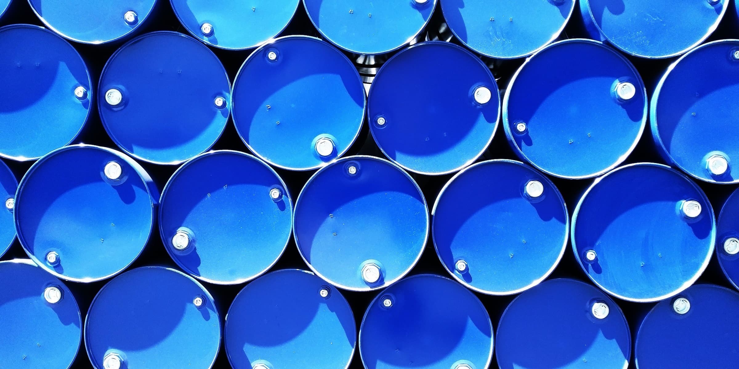 Top view of stacked blue industrial drums