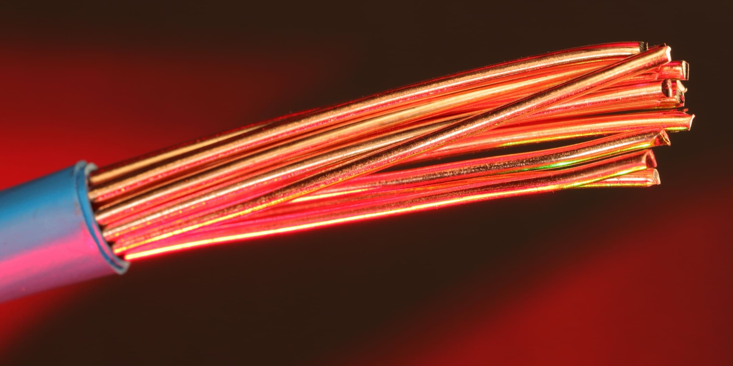 Copper wires lit by red light